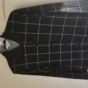 NEW.  LADIES BLACK AND WHITE PLAID JACKET.  SIZE XL